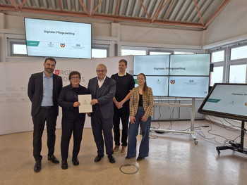 Bescheidübergabe Pflegezwilling