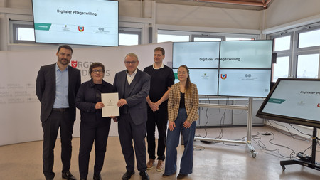 Bescheidübergabe Pflegezwilling