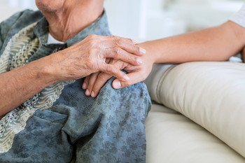 Pflegekraft mit Patienten